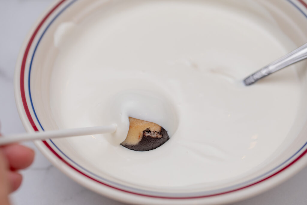 Slutty Brownie Cake Pops dipping
